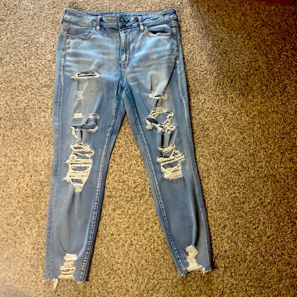 Distressed AE skinny jeans